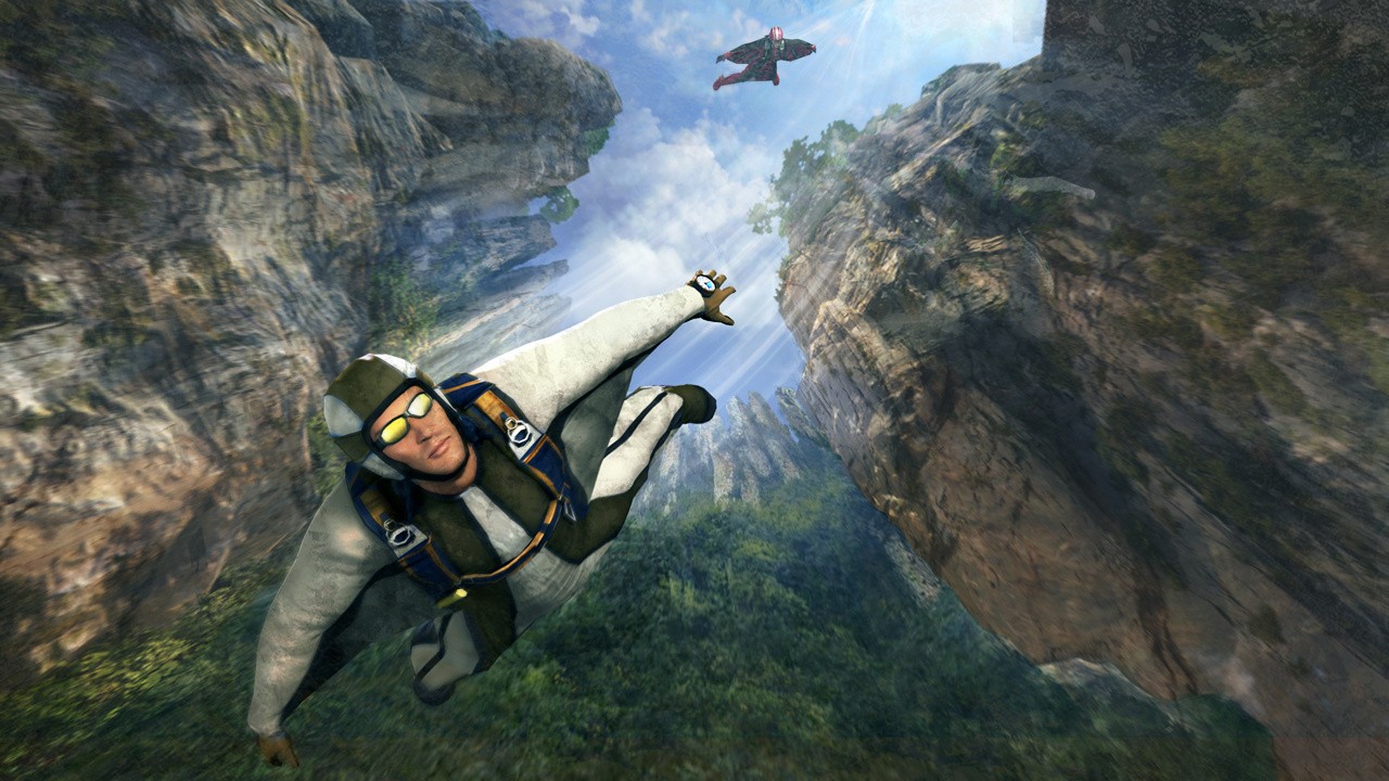 MotionSports: Adrenaline. A wingsuit flier soars through a rocky canyon.